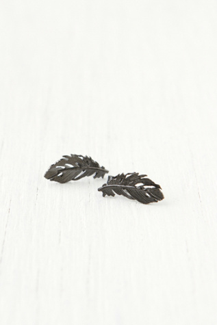 Alex Monroe Feather Studs in earrings