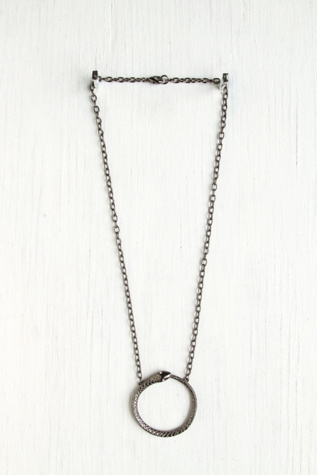 Arms and Armory Eternity Snake Pendant in jewelry